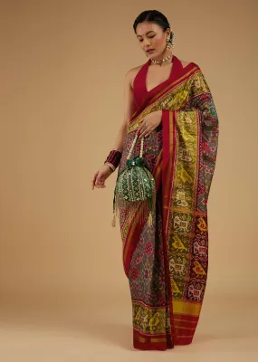 Citrus Green Saree In Silk With Ikat Weave Patola Work