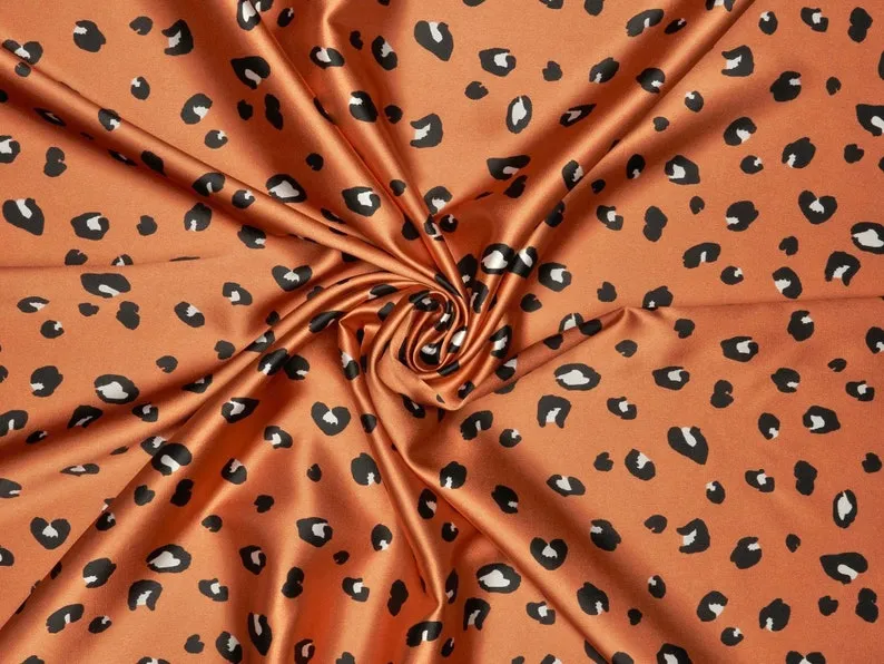 Faux silk cheetah satin fabric by the yard