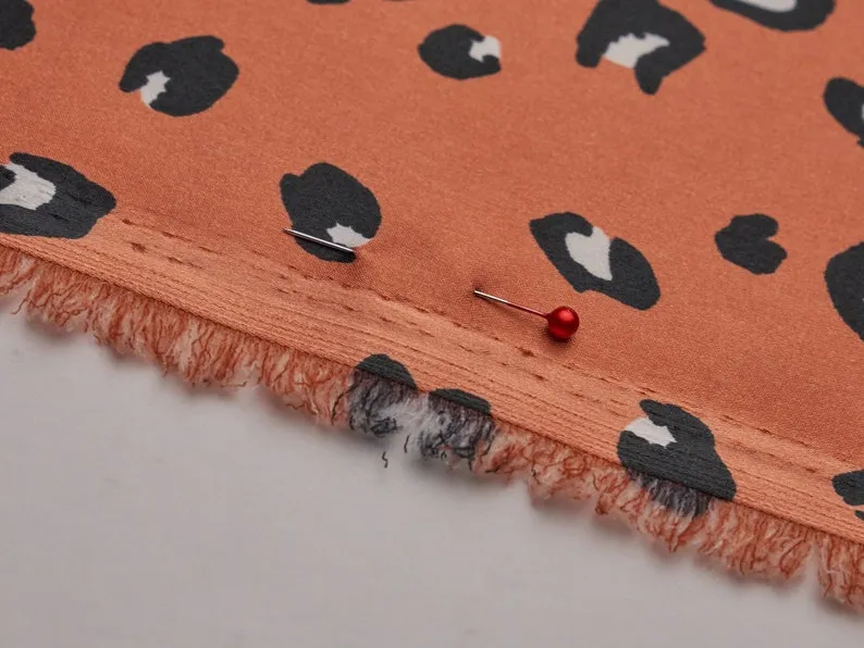Faux silk cheetah satin fabric by the yard