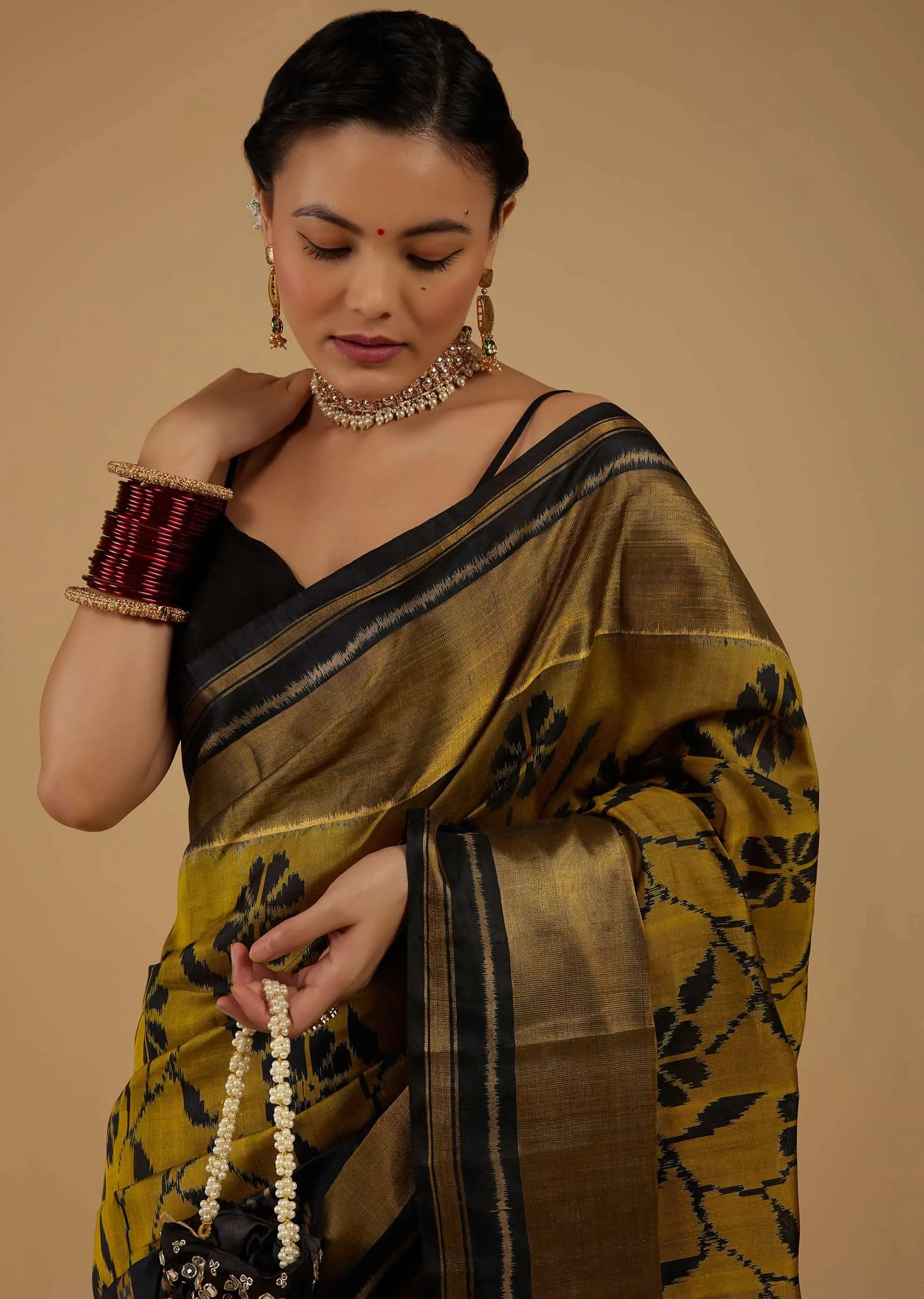 Kalki Antique Moss Green And Black Saree In Silk With Ikat Weave Patola Floral Work